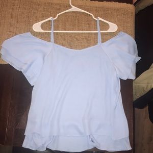 A baby blue off the shoulder shirt sooo cute!!